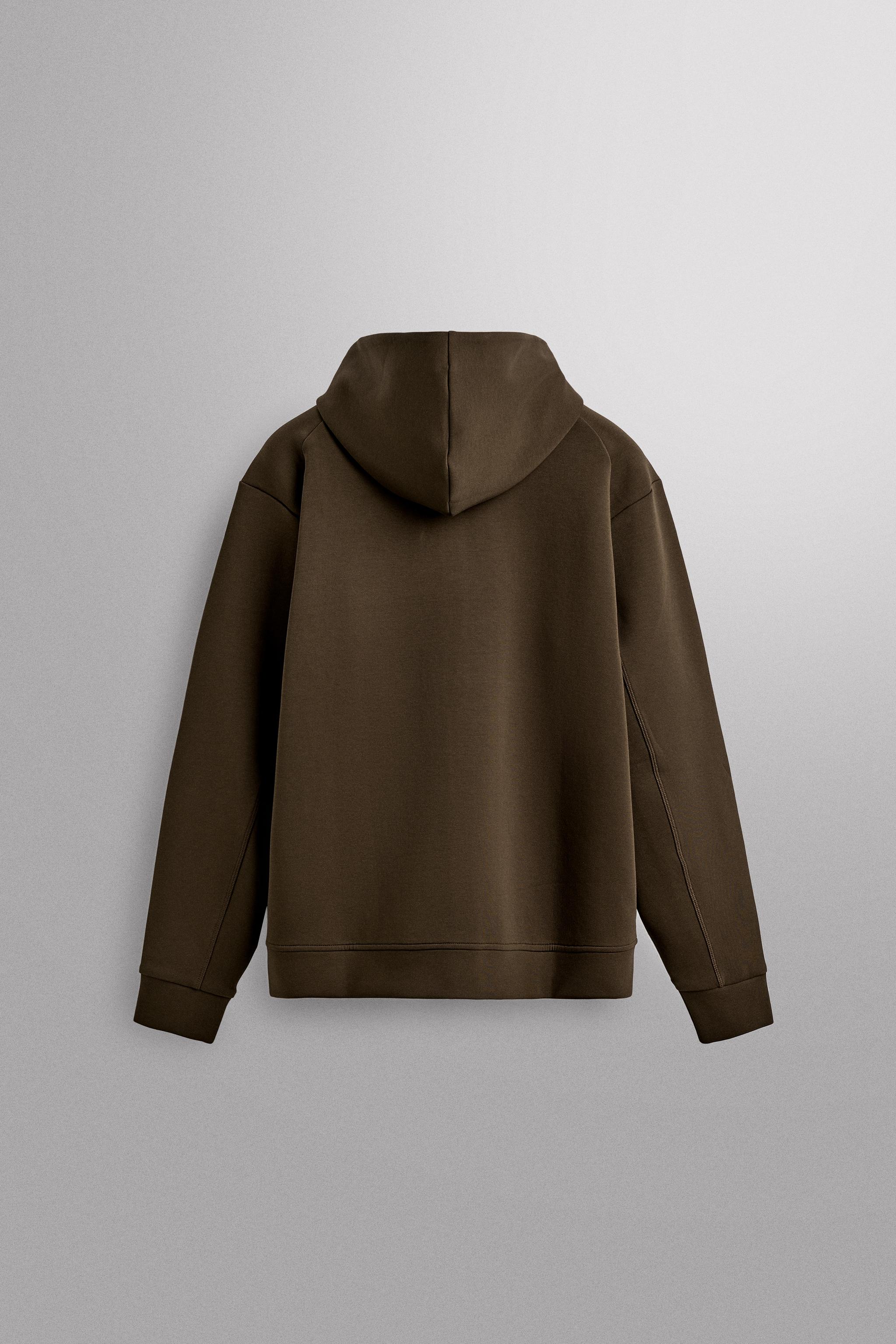 SWEAT TECHNIQUE ZIPPÉ À CAPUCHE
